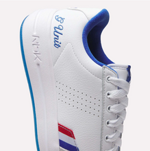 Load image into Gallery viewer, White sneaker with blue accents and 'G-Unit' branding on a white background