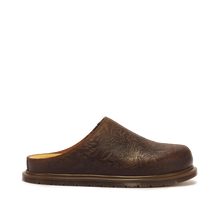 Load image into Gallery viewer, A single dark brown leather clog shoe with an embossed floral pattern, shown in a side profile on a solid white background.