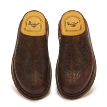 Load image into Gallery viewer, A pair of dark brown embossed leather slip-on shoes by Dr. Martens, shown from a top-down view on a white background.
