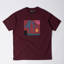 Load image into Gallery viewer, A maroon short-sleeve crewneck t-shirt featuring a square graphic print on the chest with a blue silhouette, pink and yellow shapes, and the word 'purra'.